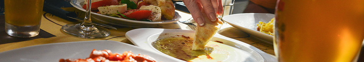 Eating Greek Mediterranean at Mykonos Grill restaurant in Rockville, MD.